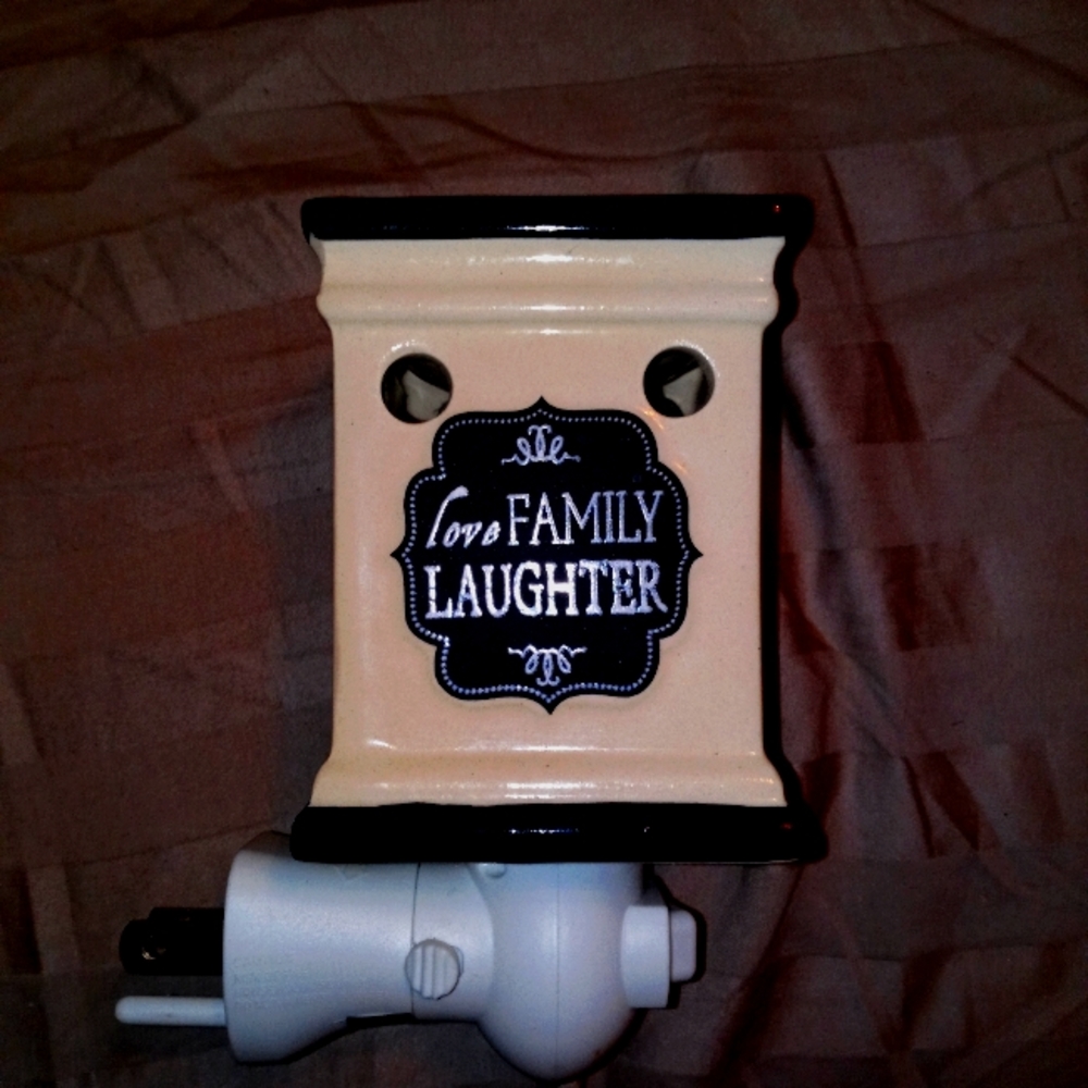 A Scentsy burner and the wax